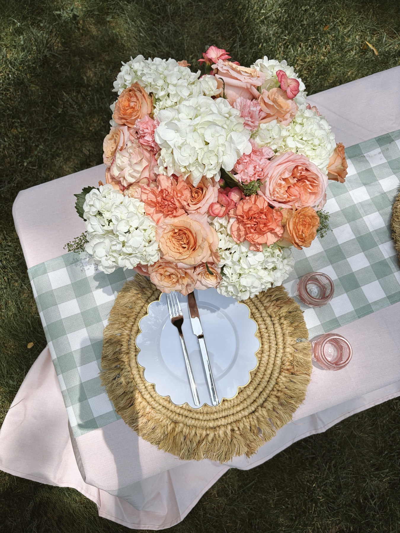Peach roses and white hydrangea tablescape from above