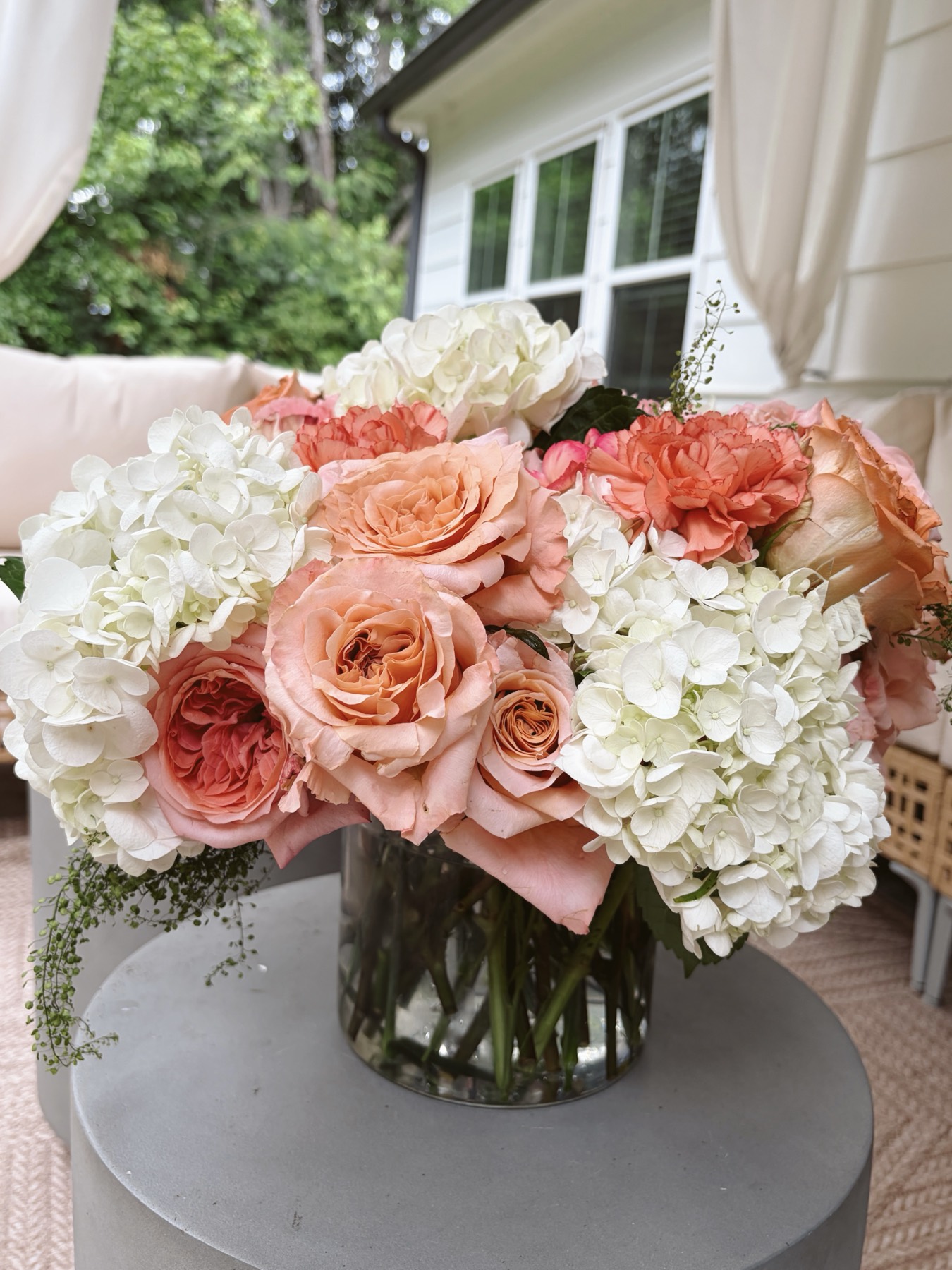Peach garden roses and white hydrangea bouquet